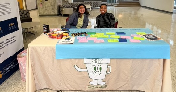 Students from SHARP host a collaborative tabling event on Monday of NPHW
